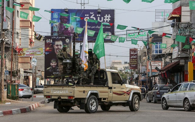 Members of Izz al-Din al-Qassam Brigades, the Hamas military wing, patrol in Rafah, Gaza Strip, December 14, 2022. (Abed Rahim Khatib/Flash90) Members of Izz al-Din al-Qassam Brigades, the Hamas military wing, patrol in Rafah, Gaza Strip, December 14, 2022. (Abed Rahim Khatib/Flash90)