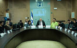 Ya'akov Asher, head of the Interior and Environmental Protection Committee, center, leads a committee meeting at the Knesset in Jerusalem, January 10, 2023. (Yonatan Sindel/Flash90)