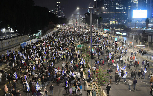 People protest against the proposed changes to the legal system, in Tel Aviv, on January 28, 2023. (Tomer Neuberg/Flash90) People protest against the proposed changes to the legal system, in Tel Aviv, on January 28, 2023. (Tomer Neuberg/Flash90)