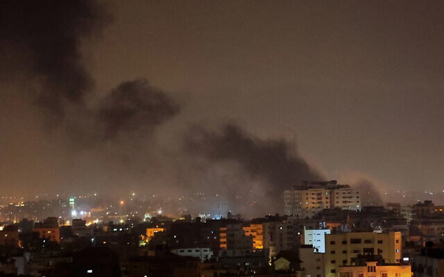 Illustrative: Smoke rises after an Israeli airstrike in the Gaza Strip, early morning on February 2, 2023. (Attia Muhammed/Flash90) Illustrative: Smoke rises after an Israeli airstrike in the Gaza Strip, early morning on February 2, 2023. (Attia Muhammed/Flash90)