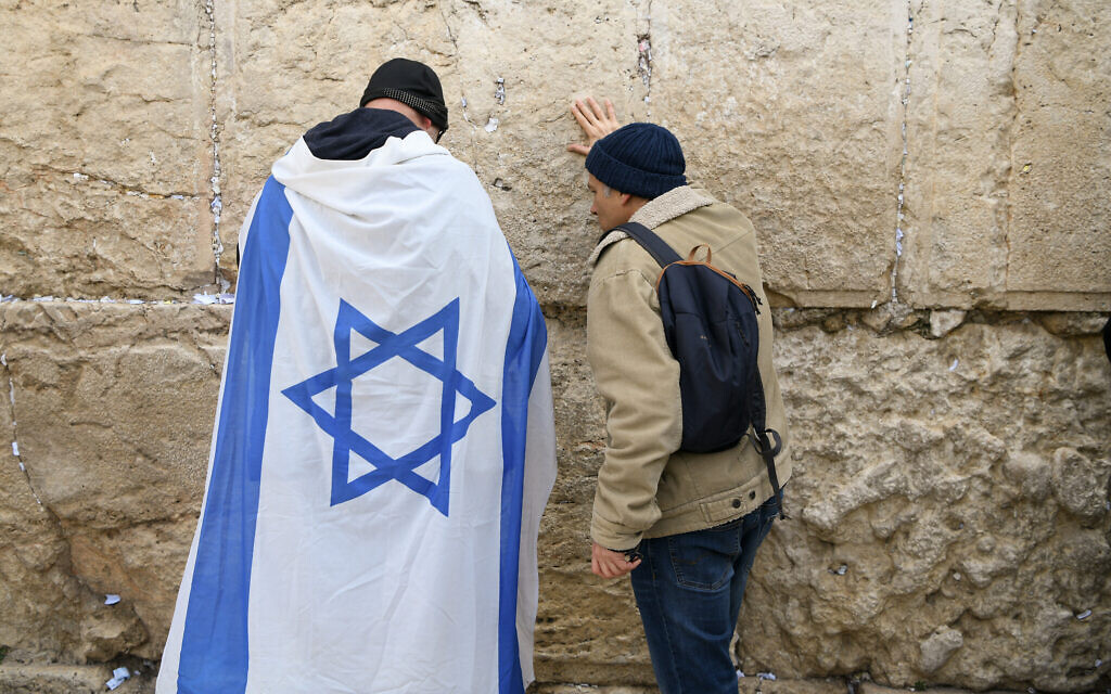 Protesters at the Western Wall in Jerusalem's Old City for a prayer session ahead of an anti-government demonstration, February 13, 2023 (Arie Leib Abrams/FLASH90) Protesters at the Western Wall in Jerusalem's Old City for a prayer session ahead of an anti-government demonstration, February 13, 2023 (Arie Leib Abrams/FLASH90)