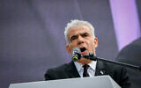 Opposition leader Yair Lapid speaks at a protest against the judicial overhaul, February 13, 2023. (Arie Leib Abrams/Flash90)