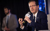 President Isaac Herzog speaks at the annual Jerusalem Conference of the 'Besheva' group in Jerusalem, on February 21, 2023. (Yonatan Sindel/Flash90)