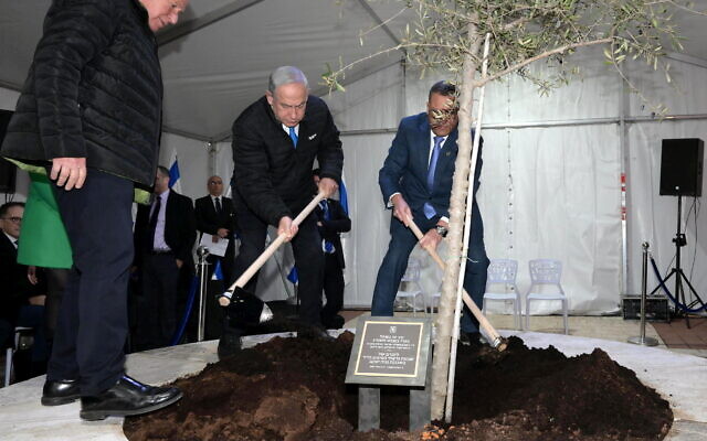 Prime Minister Benjamin Netanyahu plants an olive tree in the Jerusalem neighborhood of Neve Ya'acov near the site of a deadly terror attack on February 6, 2023 (Amos Ben Gershon/GPO) Prime Minister Benjamin Netanyahu plants an olive tree in the Jerusalem neighborhood of Neve Ya'acov near the site of a deadly terror attack on February 6, 2023 (Amos Ben Gershon/GPO)