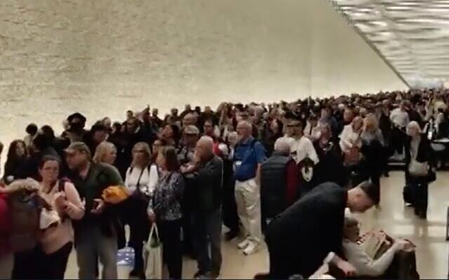 Tourists arriving at Ben Gurion Airport wait in long queues to clear passport control, February 13, 2023. (Screenshot/Channel 12; used in accordance with Clause 27a of the Copyright Law) Tourists arriving at Ben Gurion Airport wait in long queues to clear passport control, February 13, 2023. (Screenshot/Channel 12; used in accordance with Clause 27a of the Copyright Law)