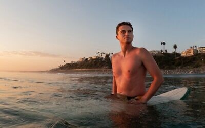 Josh Greene directed 'Waves Apart,' a documentary about the antisemitic history of surfing. (Courtesy of Greene)