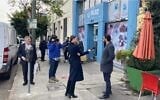 Television and newspaper reporters in Los Angeles interview passersby in the Jewish neighborhood of Pico-Robertson following two shootings that occurred in the area in the previous two days on February 17, 2023. (Asaf Elia-Shalev)