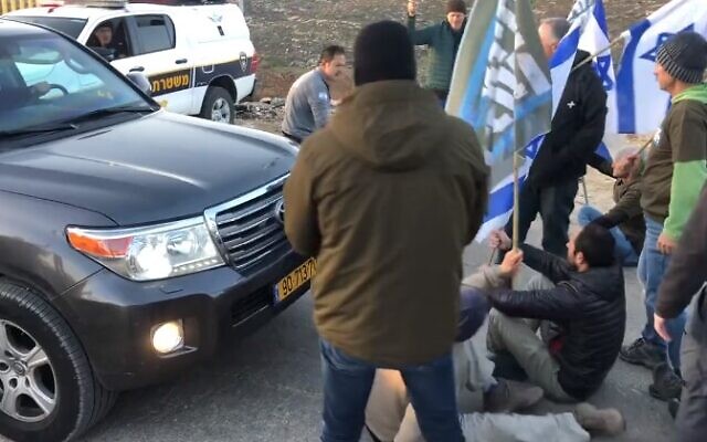 Protesters block the car of MK Simcha Rothman outside his home in the West Bank on February 20, 2023 (Screencapture/Twitter Used in accordance with Clause 27a of the Copyright Law) Protesters block the car of MK Simcha Rothman outside his home in the West Bank on February 20, 2023 (Screencapture/Twitter Used in accordance with Clause 27a of the Copyright Law)