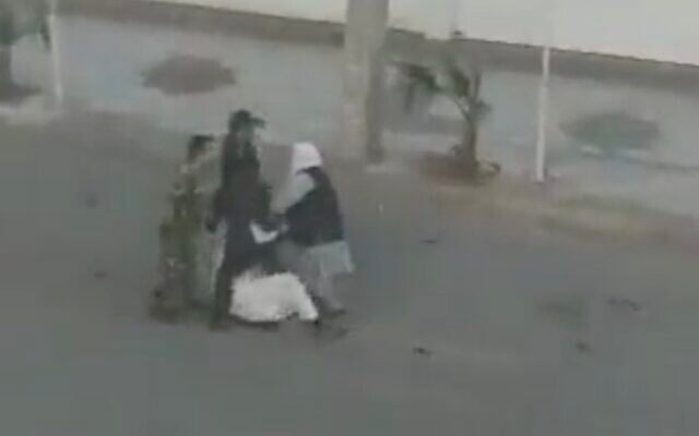 A screenshot from unverified social media video allegedly showing Iranian security forces beating a protester in Iran's southeastern city of Zahedan, February 24, 2022. (Twitter video screenshot; used in accordance with Clause 27a of the Copyright Law) A screenshot from unverified social media video allegedly showing Iranian security forces beating a protester in Iran's southeastern city of Zahedan, February 24, 2022. (Twitter video screenshot; used in accordance with Clause 27a of the Copyright Law)