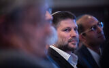 Finance Minister Bezalel Smotrich at a conference in Jerusalem, February 21, 2023. (Yonatan Sindel/Flash90)