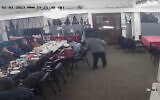 Screenshots from CCTV footage of the Schneerson Center in San Francisco as an unknown man fires blanks into the room during a study session, February 1, 2023. (Courtesy/J. The Jewish News of Northern California via JTA)