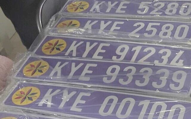License plates found by police in the apartment of Shay Karamosta, the self-declared king of Yashar-El, Hadera, northern Israel, February 6, 2023. (Israel Police) License plates found by police in the apartment of Shay Karamosta, the self-declared king of Yashar-El, Hadera, northern Israel, February 6, 2023. (Israel Police)