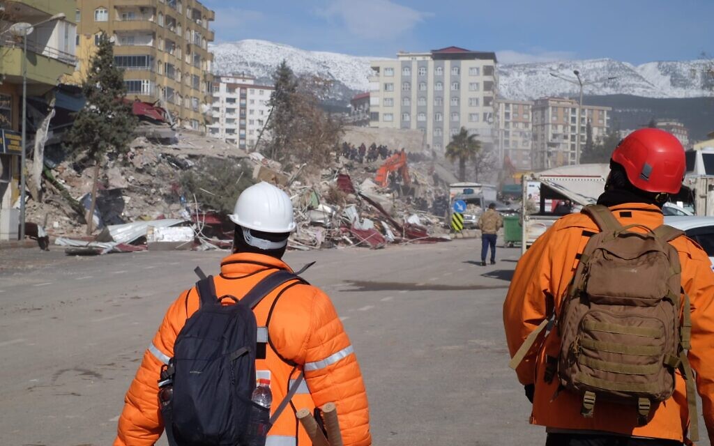 Israeli rescue teams work to retrieve survivors from the rubble of collapsed buildings in Kahramanmaras, on February 8, 2023, following a 7.8-magnitude earthquake that struck southeast Turkey. (Judah Ari Gross/Times of Israel)