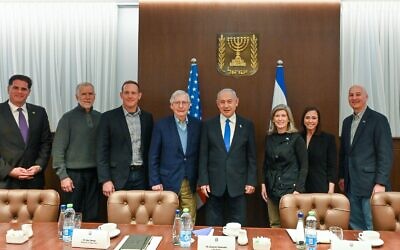Prime Minister Benjamin Netanyahu (fourth from right) meets with US Senate Minority Leader Mitch McConnell (fourth from left) and GOP senators in his office, February 23, 2023 (Kobi Gideon/GPO)