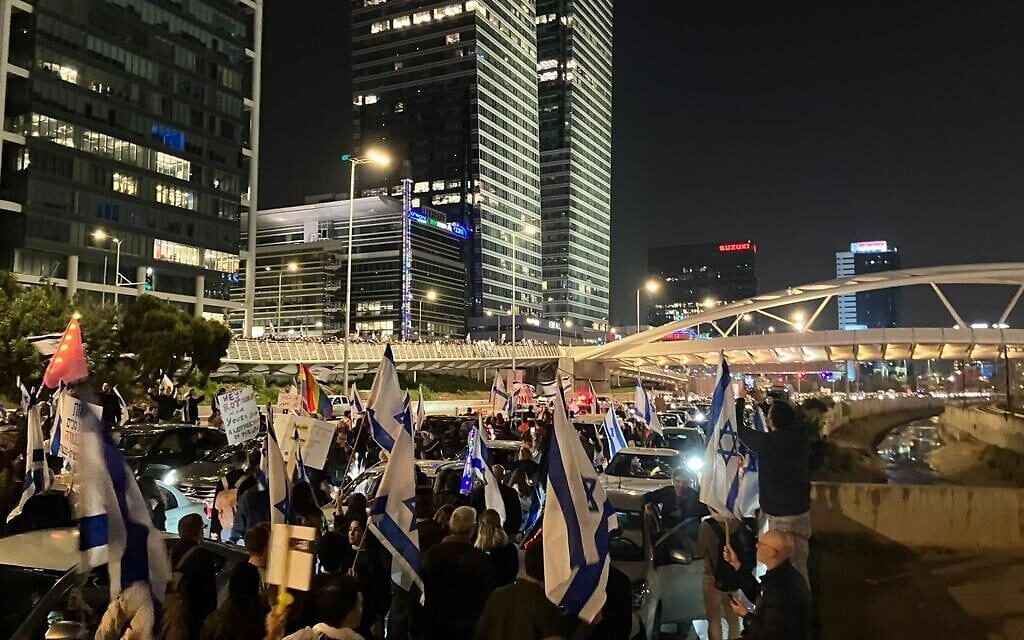 Protesters blocking the Ayalon Highway during an anti-government rally in Tel Aviv on February 25, 2023. (Times of Israel staff) Protesters blocking the Ayalon Highway during an anti-government rally in Tel Aviv on February 25, 2023. (Times of Israel staff)
