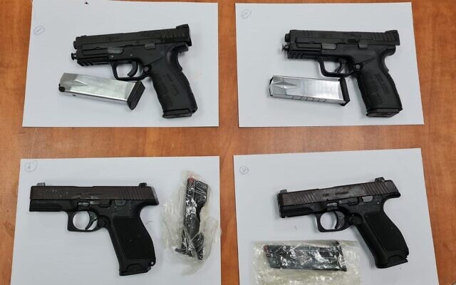 Weapons seized by Israeli troops after an alleged gun-smuggling over the border with Lebanon on February 19, 2023. (Israel Defense Forces) Weapons seized by Israeli troops after an alleged gun-smuggling over the border with Lebanon on February 19, 2023. (Israel Defense Forces)