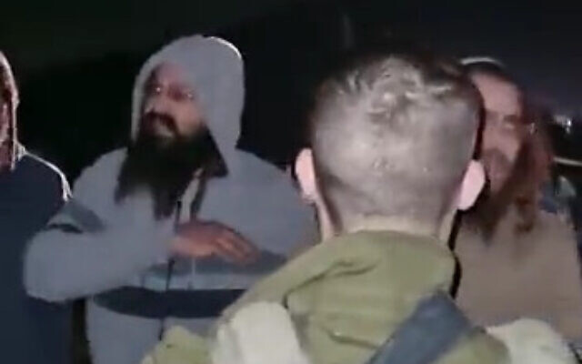 Settlers confront soldiers near the West Bank village of Urif, February 15, 2023. (Screenshot: Twitter) Settlers confront soldiers near the West Bank village of Urif, February 15, 2023. (Screenshot: Twitter)