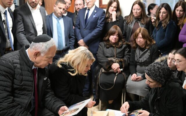 Prime Minister Benjamin Netanyahu and his wife Sara pay a condolence visit to the Paley family, whose two young children were killed in a ramming attack in Jerusalem, February 14, 2023. (Amos Ben Gershom/GPO) Prime Minister Benjamin Netanyahu and his wife Sara pay a condolence visit to the Paley family, whose two young children were killed in a ramming attack in Jerusalem, February 14, 2023. (Amos Ben Gershom/GPO)