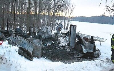 Investigators at a fire at Camp B'nai B'rith in Pontiac, Quebec on Feb. 12, 2023. (Courtesy Collines-de-l’Outaouais via JTA) Investigators at a fire at Camp B'nai B'rith in Pontiac, Quebec on Feb. 12, 2023. (Courtesy Collines-de-l’Outaouais via JTA)