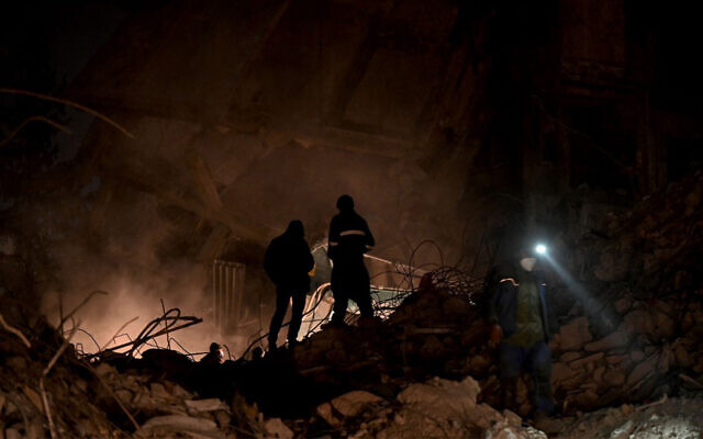 Rescue teams continue to search for victims and survivors in the rubble of collapsed buildings after a 7.8 magnitude earthquake struck the border region of Turkey and Syria earlier in the week, in Kahramanmaras, Turkey, February 13, 2023. (Ozan Kose/AFP) Rescue teams continue to search for victims and survivors in the rubble of collapsed buildings after a 7.8 magnitude earthquake struck the border region of Turkey and Syria earlier in the week, in Kahramanmaras, Turkey, February 13, 2023. (Ozan Kose/AFP)