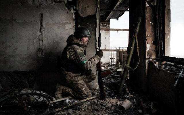 A Ukrainian serviceman from the State Border Guard Service in Bakhmut on February 9, 2023. (Yasuyoshi Chiba/AFP) A Ukrainian serviceman from the State Border Guard Service in Bakhmut on February 9, 2023. (Yasuyoshi Chiba/AFP)