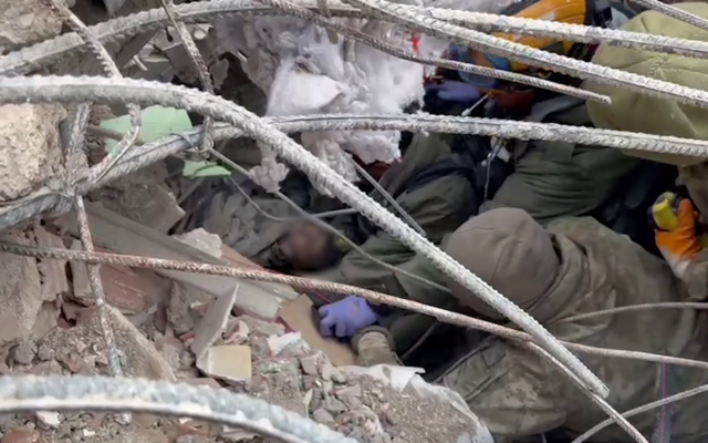 IDF and local rescuers pull a 10-year-old boy out from under the rubble, 100 hours after an earthquake struck in Turkey, on February 10, 2023 (Screencapture/ Israel Defense Forces video) IDF and local rescuers pull a 10-year-old boy out from under the rubble, 100 hours after an earthquake struck in Turkey, on February 10, 2023 (Screencapture/ Israel Defense Forces video)