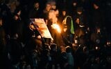 Illustrative: Lazio fans cheer during the Italian Serie A soccer match between Napoli and Lazio on March 3, 2023, at the Diego-Maradona stadium in Naples. (Alberto Pizzoli/AFP)