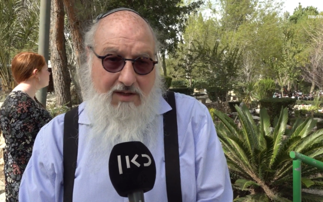Former Israeli spy Jonathan Pollard speaks to the Kan public broadcaster at a memorial service for two brothers killed in a terrorist attack, Jerusalem, March 5, 2023. (Kan screenshot: Used in accordance with Clause 27a of the Copyright Law) Former Israeli spy Jonathan Pollard speaks to the Kan public broadcaster at a memorial service for two brothers killed in a terrorist attack, Jerusalem, March 5, 2023. (Kan screenshot: Used in accordance with Clause 27a of the Copyright Law)