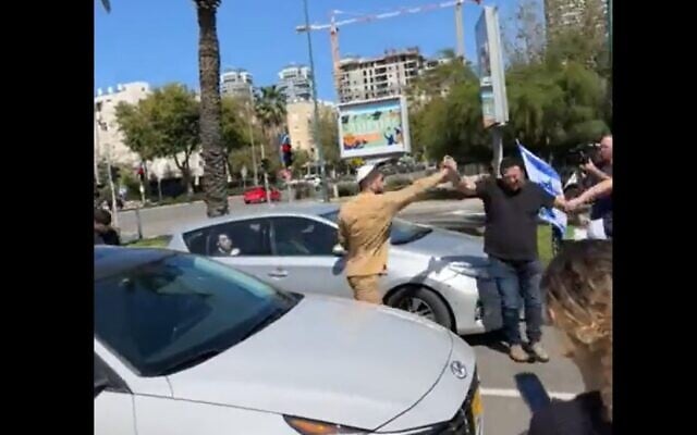 Ram Eyal, 24, threatens protesters with pepper spray at an anti-judicial overhaul rally in Tel Aviv, March 16, 2023. (Twitter video screenshot: used in accordance with Clause 27a of the Copyright Law) Ram Eyal, 24, threatens protesters with pepper spray at an anti-judicial overhaul rally in Tel Aviv, March 16, 2023. (Twitter video screenshot: used in accordance with Clause 27a of the Copyright Law)