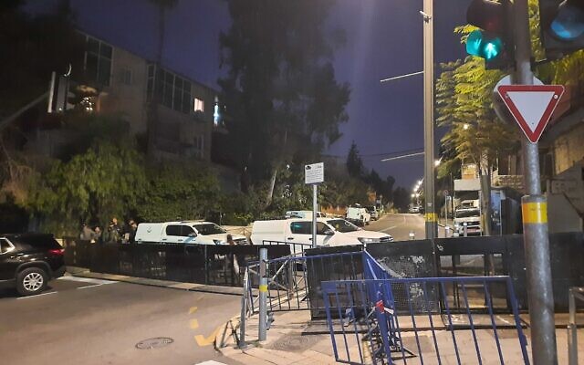 Police set up barricades to prevent protesters reaching the Jerusalem home of Prime Minister Benjamin Netanyahu on March 1, 2023 (Amy Spiro/Times of Israel) Police set up barricades to prevent protesters reaching the Jerusalem home of Prime Minister Benjamin Netanyahu on March 1, 2023 (Amy Spiro/Times of Israel)