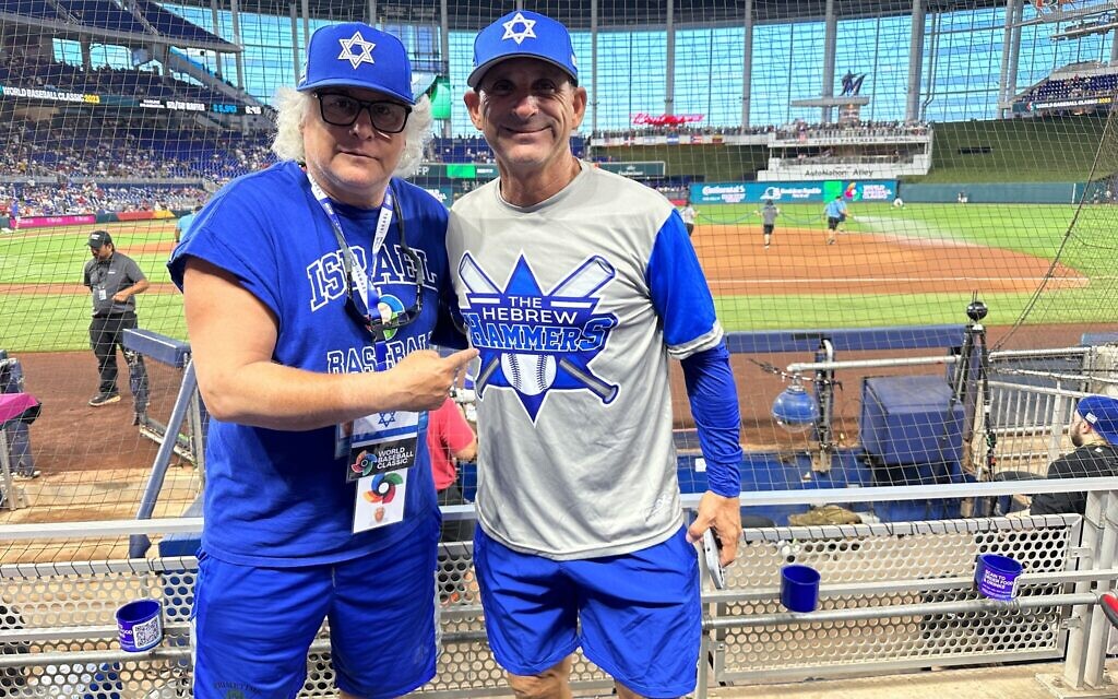 Stu Moss, left, and David Bogatz at Team Israel's game against Puerto Rico, Monday, March 13, 2022, at the World Baseball Classic in Miami. (Jacob Gurvis/ JTA) Stu Moss, left, and David Bogatz at Team Israel's game against Puerto Rico, Monday, March 13, 2022, at the World Baseball Classic in Miami. (Jacob Gurvis/ JTA)