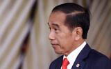 Indonesian President Joko Widodo arrives at the EU-ASEAN (Association of Southeast Asian Nations) summit at the European Council headquarters in Brussels on December 14, 2022. (Photo by Kenzo TRIBOUILLARD / AFP)