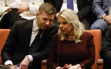 Sara Netanyahu, right, and her son Yair watch from the gallery as the new government of Prime Minister Benjamin Netanyahu (not in picture) is swon in at the Knesset in Jerusalem, December 29, 2022. (Amir Cohen/Pool/AFP)