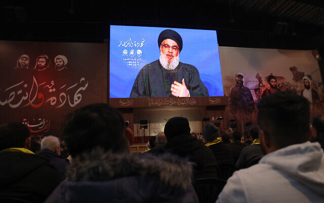 Supporters of the Lebanese terror group Hezbollah attend a televised speech by the group's leader Hassan Nasrallah in Beirut's southern suburbs, on February 16, 2023. (Anwar Amro/ AFP) Supporters of the Lebanese terror group Hezbollah attend a televised speech by the group's leader Hassan Nasrallah in Beirut's southern suburbs, on February 16, 2023. (Anwar Amro/ AFP)