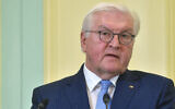 Germany's President Frank-Walter Steinmeier speaks in Putrajaya, on February 17, 2023. (Arif Kartono/AFP)