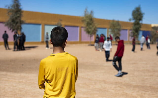 Children of foreign Islamic State fighters walk in a playground at the Orkesh rehabilitation center in the countryside of Qamishli in northeastern Syria on March 7, 2023. (Photo by Delil SOULEIMAN / AFP) Children of foreign Islamic State fighters walk in a playground at the Orkesh rehabilitation center in the countryside of Qamishli in northeastern Syria on March 7, 2023. (Photo by Delil SOULEIMAN / AFP)