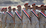 Fighters loyal to Yemen's Saudi-backed government take part in a parade during a graduation ceremony of officers and the completion of specialized military courses, in the country's northeastern province of Marib, on March 17, 2023. (Photo by - / AFP)