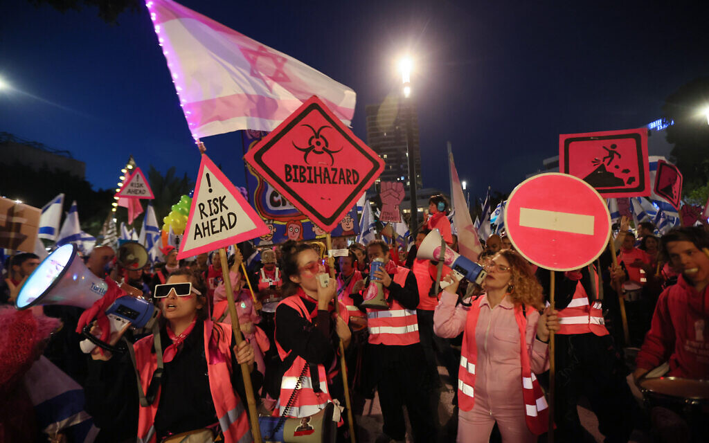 Protesters gather during a rally against the government's controversial judicial overhaul bill in Tel Aviv on March 18, 2023. (Jack Guez/AFP)