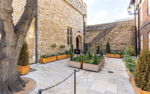 The Tower of London's Lost Garden and exterior of the Bloody Tower. (© Historic Royal Palaces)