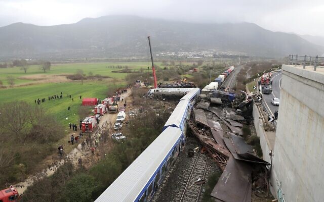 A crane operator, firefighters and rescuers work the scene of a collision in Tempe, about 376 kilometers (235 miles) north of Athens, near Larissa city, Greece, March 1, 2023. (AP/Vaggelis Kousioras) A crane operator, firefighters and rescuers work the scene of a collision in Tempe, about 376 kilometers (235 miles) north of Athens, near Larissa city, Greece, March 1, 2023. (AP/Vaggelis Kousioras)