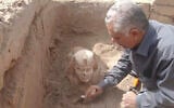In this undated photo distributed March 6, 2023, by the Egyptian Ministry of Tourism and Antiquities, a sphinx statue believed to be made in the likeness of a Roman emperor is uncovered from an archaeological site in Qena, Egypt. (Egyptian Ministry of Tourism and Antiquities via AP)