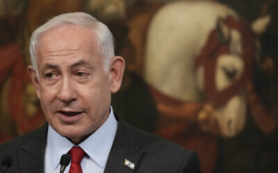 Prime Minister Benjamin Netanyahu attends a joint press conference with Italian Premier Giorgia Meloni at Chigi Palace government offices in Rome, Friday, March 10, 2023. (AP Photo/Andrew Medichini)