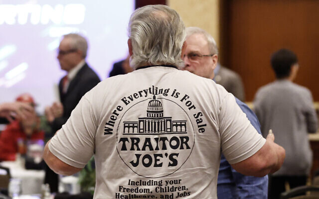 A participant wearing a shirt mocking US President Joe Biden is seen before an Election Conspiracy Forum, March 11, 2023, in Franklin, Tennessee. (AP Photo/Wade Payne) A participant wearing a shirt mocking US President Joe Biden is seen before an Election Conspiracy Forum, March 11, 2023, in Franklin, Tennessee. (AP Photo/Wade Payne)