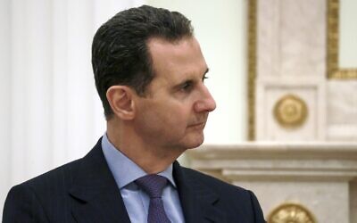 Syrian President Bashar Assad listens to Russian President Vladimir Putin during their meeting at the Kremlin in Moscow, Russia, March 15, 2023. (Vladimir Gerdo, Sputnik, Kremlin Pool Photo via AP)