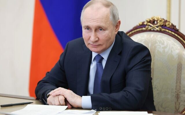 Russian President Vladimir Putin chairs a meeting on the social and economic development of Crimea and Sevastopol via a videoconference at the Moscow's Kremlin in Moscow, Russia, Friday, March 17, 2023. (Sputnik, Kremlin Pool Photo via AP) Russian President Vladimir Putin chairs a meeting on the social and economic development of Crimea and Sevastopol via a videoconference at the Moscow's Kremlin in Moscow, Russia, Friday, March 17, 2023. (Sputnik, Kremlin Pool Photo via AP)