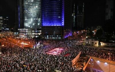 Israelis protest against plans by Prime Minister Benjamin Netanyahu's government to overhaul Israel's judicial system, in Tel Aviv, Israel, March 18, 2023. (AP Photo/Tsafrir Abayov)