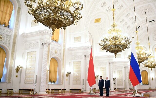 Russian President Vladimir Putin, right, and Chinese President Xi Jinping attend an official welcome ceremony at The Grand Kremlin Palace, in Moscow, Russia, March 21, 2023. (Alexey Maishev, Sputnik, Kremlin Pool Photo via AP) Russian President Vladimir Putin, right, and Chinese President Xi Jinping attend an official welcome ceremony at The Grand Kremlin Palace, in Moscow, Russia, March 21, 2023. (Alexey Maishev, Sputnik, Kremlin Pool Photo via AP)