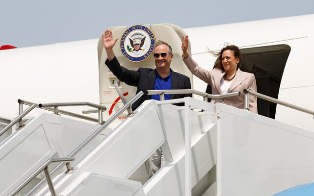US Vice President Kamala Harris and second gentleman Douglas Emhoff wave as they depart Accra, Ghana, for Dar Es Salaam, Tanzania, Wednesday March 29, 2023. (AP Photo/Misper Apawu) US Vice President Kamala Harris and second gentleman Douglas Emhoff wave as they depart Accra, Ghana, for Dar Es Salaam, Tanzania, Wednesday March 29, 2023. (AP Photo/Misper Apawu)