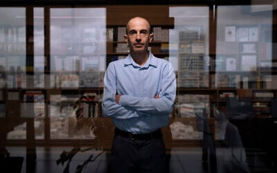 Israeli historian Yuval Noah Harari poses for a photo at his office in Tel Aviv, Thursday, March 30, 2023. (AP Photo/Oded Balilty)