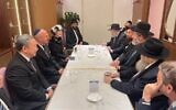 Israeli Ashkenazi Chief Rabbi David Lau, third from bottom right, meets with Jeffrey Schwartz, third from left, at the Jeffrey D. Schwartz Jewish Community Center in Taipei, in February 2023. (Courtesy of the Jeffrey D. Schwartz and Na Tang Jewish Taiwan Cultural Association)